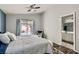 Bright bedroom features ensuite bathroom with pool view at 1010 Christopher View Ave, North Las Vegas, NV 89032