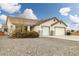 Lovely single-story home with a spacious two-car garage and tiled roof at 1131 S Blagg Rd, Pahrump, NV 89048