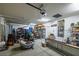 Spacious garage offering ample storage and organization, featuring many assorted items at 1131 S Blagg Rd, Pahrump, NV 89048