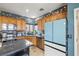 This beautiful kitchen has wooden cabinets, modern appliances, and is accented by string lights and custom decor at 1131 S Blagg Rd, Pahrump, NV 89048