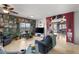 Cozy living room featuring tile floors and ample natural light at 1131 S Blagg Rd, Pahrump, NV 89048