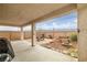 Enjoy outdoor living on this covered patio with a picnic table, fire pit, and mountain views at 1131 S Blagg Rd, Pahrump, NV 89048