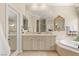 Elegant bathroom with tiled floors, tub, and lots of counter space at 1303 Panini Dr, Henderson, NV 89052