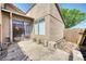 Outdoor patio area with concrete flooring and a sliding glass door for indoor/outdoor living at 1501 Living Desert Dr # A, Las Vegas, NV 89119