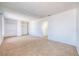 Spacious bedroom features neutral carpet, ample closet space and a bright, white interior at 1501 Living Desert Dr # A, Las Vegas, NV 89119