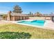 Inviting swimming pool with ample deck space, perfect for outdoor relaxation and entertainment at 1501 Living Desert Dr # A, Las Vegas, NV 89119