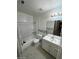 Cozy bathroom featuring a tub-shower combo, toilet, and a vanity with a sink and a wall mirror at 1617 Joshua Tree Ct, Las Vegas, NV 89108