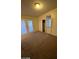 Bedroom with a closet, built-in seating, and access to the outdoors at 1617 Joshua Tree Ct, Las Vegas, NV 89108