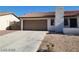 Charming single-story home features a two-car garage, low-maintenance landscaping, and a red tile roof at 1617 Joshua Tree Ct, Las Vegas, NV 89108