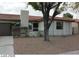 Charming single-story home features a two-car garage, low-maintenance landscaping, and a red tile roof at 1617 Joshua Tree Ct, Las Vegas, NV 89108