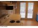 Clean kitchen boasts plenty of counter space, access to the yard, and lots of room for a chef at 1617 Joshua Tree Ct, Las Vegas, NV 89108