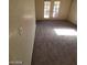 Bright living room features a sliding glass door with access to outdoor space at 1617 Joshua Tree Ct, Las Vegas, NV 89108
