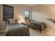 Cozy bedroom featuring two twin beds, comfortable bedding, and natural light at 18 Garden Rain Dr, Las Vegas, NV 89135