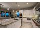 Contemporary kitchen with granite island, stainless steel appliances, and recessed lighting at 18 Garden Rain Dr, Las Vegas, NV 89135
