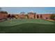 Backyard putting green with manicured turf and flags, perfect for golf enthusiasts and outdoor recreation at 18 Garden Rain Dr, Las Vegas, NV 89135