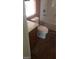 Bathroom with a toilet, tub/shower, and wooden blinds at 1837 Ardilea St, Las Vegas, NV 89135