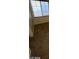 Bedroom featuring natural light through a window, enhancing its warm atmosphere at 1837 Ardilea St, Las Vegas, NV 89135