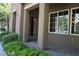 Inviting home exterior features a covered entryway with well-manicured landscaping at 1837 Ardilea St, Las Vegas, NV 89135
