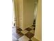 Home entryway featuring an open doorway and a view of the bathroom at 1837 Ardilea St, Las Vegas, NV 89135