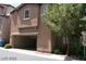 Charming two-story home with stucco siding and an attached garage at 1837 Ardilea St, Las Vegas, NV 89135