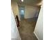 Hallway showcasing natural light and an open doorway view of another room at 1837 Ardilea St, Las Vegas, NV 89135