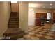 Open-concept kitchen includes wooden cabinets, stainless steel appliances, and an island bar at 1837 Ardilea St, Las Vegas, NV 89135