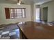Bright living area with tiled floors flowing into kitchen at 1837 Ardilea St, Las Vegas, NV 89135