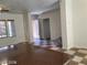 The living room features checkered floors and a view of the front door at 1837 Ardilea St, Las Vegas, NV 89135