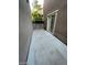 Outdoor patio with sliding glass door and concrete block fence at 1837 Ardilea St, Las Vegas, NV 89135