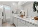 Elegant bathroom features dual sinks, ample countertop space, and a shower-tub combination at 207 Callen Falls Ave # 1713, Henderson, NV 89011