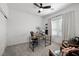 Bright bedroom featuring a modern ceiling fan, a work desk, and plenty of natural light at 207 Callen Falls Ave # 1713, Henderson, NV 89011