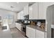 Well-appointed kitchen featuring modern appliances, sleek countertops, and ample storage space for culinary enthusiasts at 207 Callen Falls Ave # 1713, Henderson, NV 89011