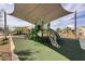 Community playground featuring modern play equipment and shade structures, perfect for outdoor Gathering fun at 207 Callen Falls Ave # 1713, Henderson, NV 89011