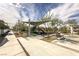 Community playground featuring play structures, benches, and trees offering shade at 207 Callen Falls Ave # 1713, Henderson, NV 89011