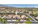 Real estate aerial view of residential community with desert landscape and mountain views at 2197 Big Bar Dr, Henderson, NV 89052