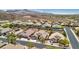 Beautiful aerial view of a residential neighborhood with well-maintained homes and desert landscape at 2197 Big Bar Dr, Henderson, NV 89052