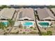 Captivating aerial view of backyard pool area with custom pool, spa, landscaping, and desert rock accents at 2197 Big Bar Dr, Henderson, NV 89052
