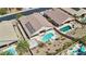 Aerial view of backyard oasis with an in-ground pool, patio and desert landscaping at 2197 Big Bar Dr, Henderson, NV 89052
