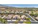Aerial view of a residential area with a view of the home, community, and mountains at 2197 Big Bar Dr, Henderson, NV 89052