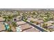Extensive aerial view of a neighborhood displaying community homes, landscaping, and streets at 2197 Big Bar Dr, Henderson, NV 89052