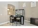 Chic bar area with a glass countertop, modern shelving, and sophisticated decor at 2197 Big Bar Dr, Henderson, NV 89052