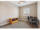Cozy bedroom with a ceiling fan, a window, and a desk at 2197 Big Bar Dr, Henderson, NV 89052