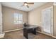 Cozy bedroom featuring a ceiling fan, natural light, and a neutral color palette at 2197 Big Bar Dr, Henderson, NV 89052