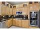 Stylish kitchen with stainless steel appliances, granite countertops, and sleek cabinetry at 2197 Big Bar Dr, Henderson, NV 89052