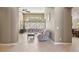 Bright living space with tile floors and large windows offering great views at 2197 Big Bar Dr, Henderson, NV 89052