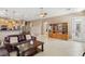Spacious living area open to the kitchen, featuring tile floors and natural lighting at 2197 Big Bar Dr, Henderson, NV 89052
