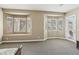 Sun-filled main bedroom with a seating area, natural light, and private access to the backyard at 2197 Big Bar Dr, Henderson, NV 89052