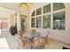 Covered patio with outdoor seating and a clear view of a pool at 2197 Big Bar Dr, Henderson, NV 89052