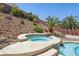 Tranquil pool and spa with desert landscape views at 2197 Big Bar Dr, Henderson, NV 89052