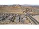 Aerial view capturing the layout of homes and roadways in the Crested Canyon community at 2367 Ridgeline Wash St, Las Vegas, NV 89138